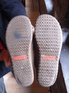 Note the worn tread from leaning to one side